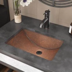 Rene Under-Mount Bathroom Sink in Copper with Grid Drain in Antique Bronze