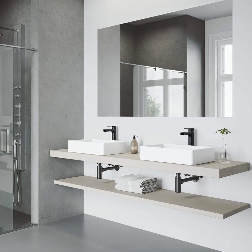 VIGO Matte Stone Magnolia Composite Rectangular Vessel Bathroom Sink in White with Faucet and Pop-Up Drain in Matte Black 4 VIGO Matte Stone Magnolia Composite Rectangular Vessel Bathroom Sink in White with Faucet and Pop-Up Drain in Matte Black - Image 2