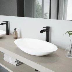VIGO Matte Stone Wisteria Composite Oval Vessel Bathroom Sink in White with Niko Faucet and Pop-Up Drain in Matte Black -Bathroom Sinks Sales matte stone vigo vessel sinks vgt987 40 1000